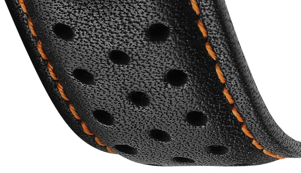 Close-up of a black leather strap with orange stitching on a white background